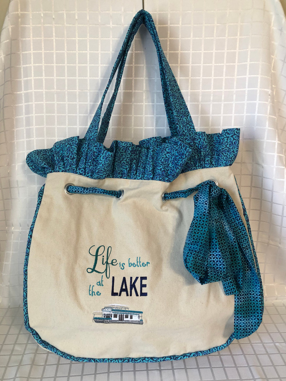 Life is better at the Lake.....Over-sized large tote specifically designed to carry everything you need to the Lake with you!