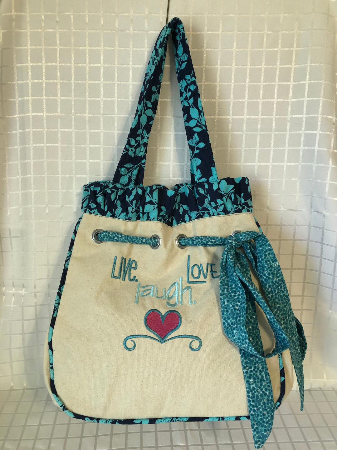 Live Love and Laugh Tote perfect for storing yarn, or carrying all your extra things with you where ever you need to go.